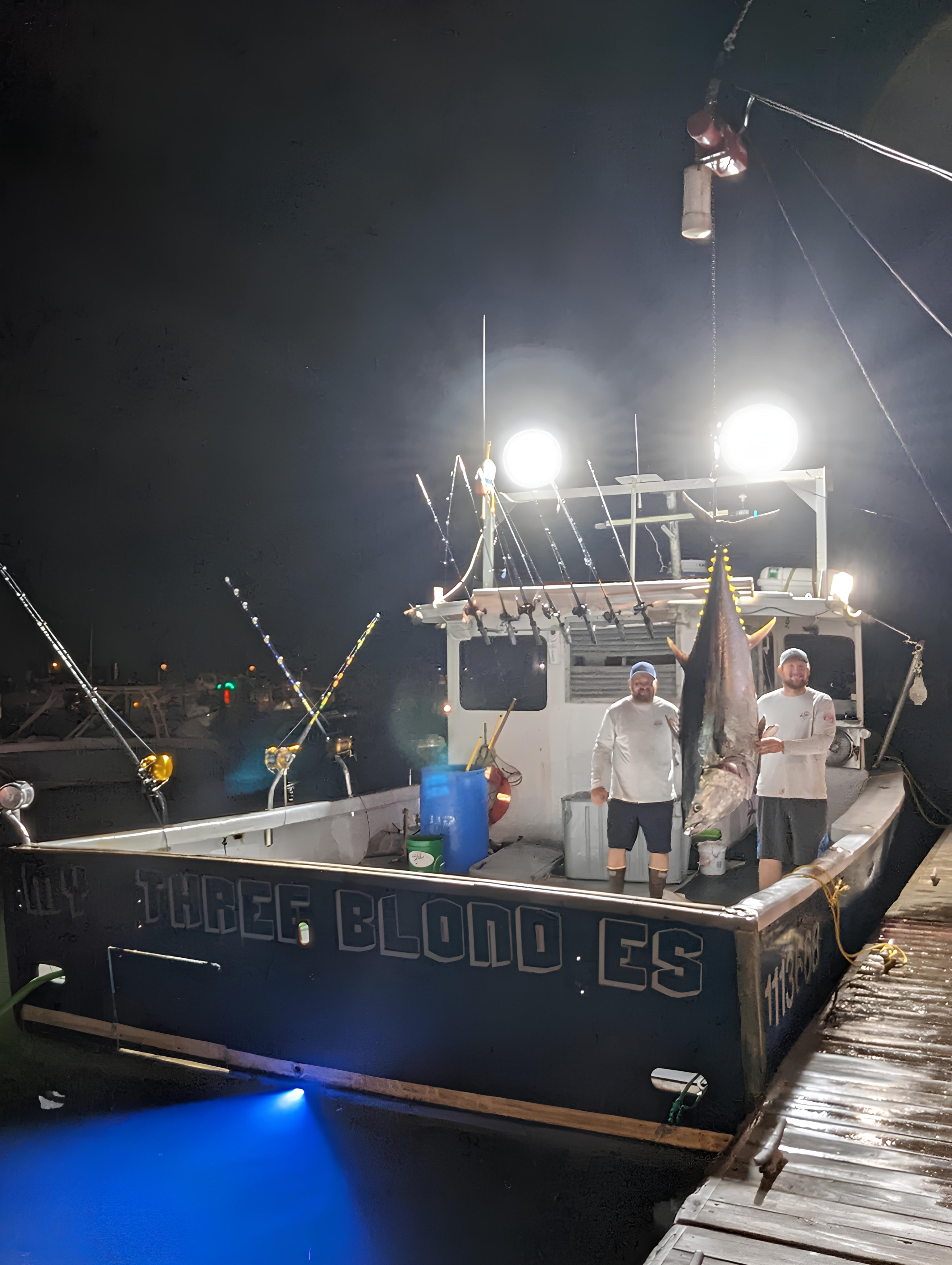Fishing boat with lights for tuna attraction